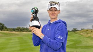 Nelly Korda with Aramco Team Series Trophy 2023