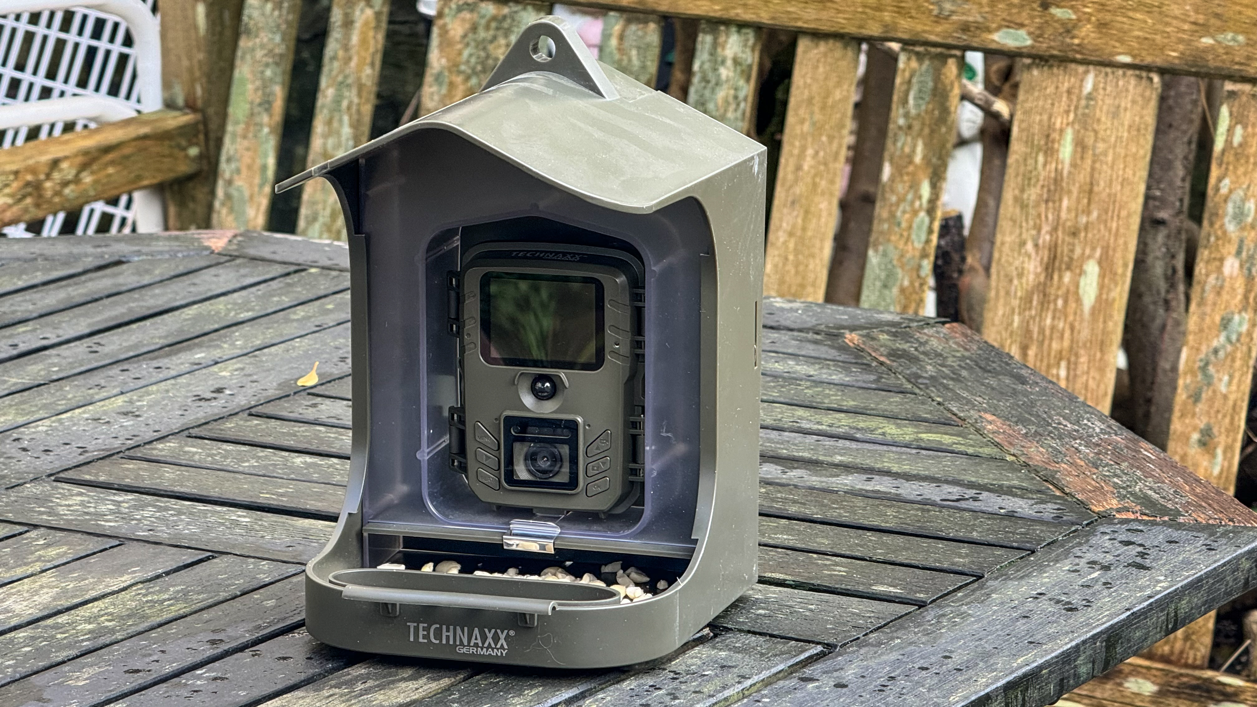 Technaxx Bird Feeder in a courtyard garden