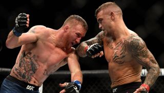 Dustin Poirier throws an elbow at Justin Gaethje in their lightweight fight during the UFC Fight Night event at Gila River Arena on April 14, 2018