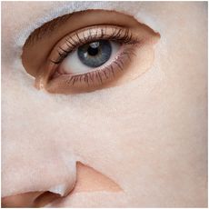 sheet mask and a blue eye