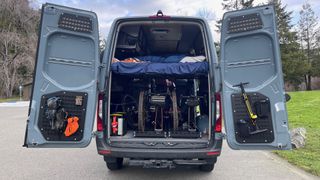 image of the back entry of a converted Sprinter van