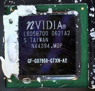 The Nvidia GeForce Go 7950 GTX 512 MB graphics processor complete with thermal paste splotches.