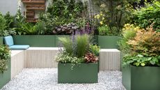 garden design with gravel and raised bed planting
