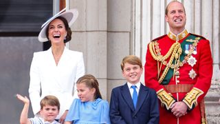 Prince Louis of Cambridge, Catherine, Duchess of Cambridge, Princess Charlotte of Cambridge, Prince George of Cambridge and Prince William, Duke of Cambridge watch the RAF flypast on the balcony of Buckingham Palace during the Trooping the Colour parade on June 02, 2022 in London, England.