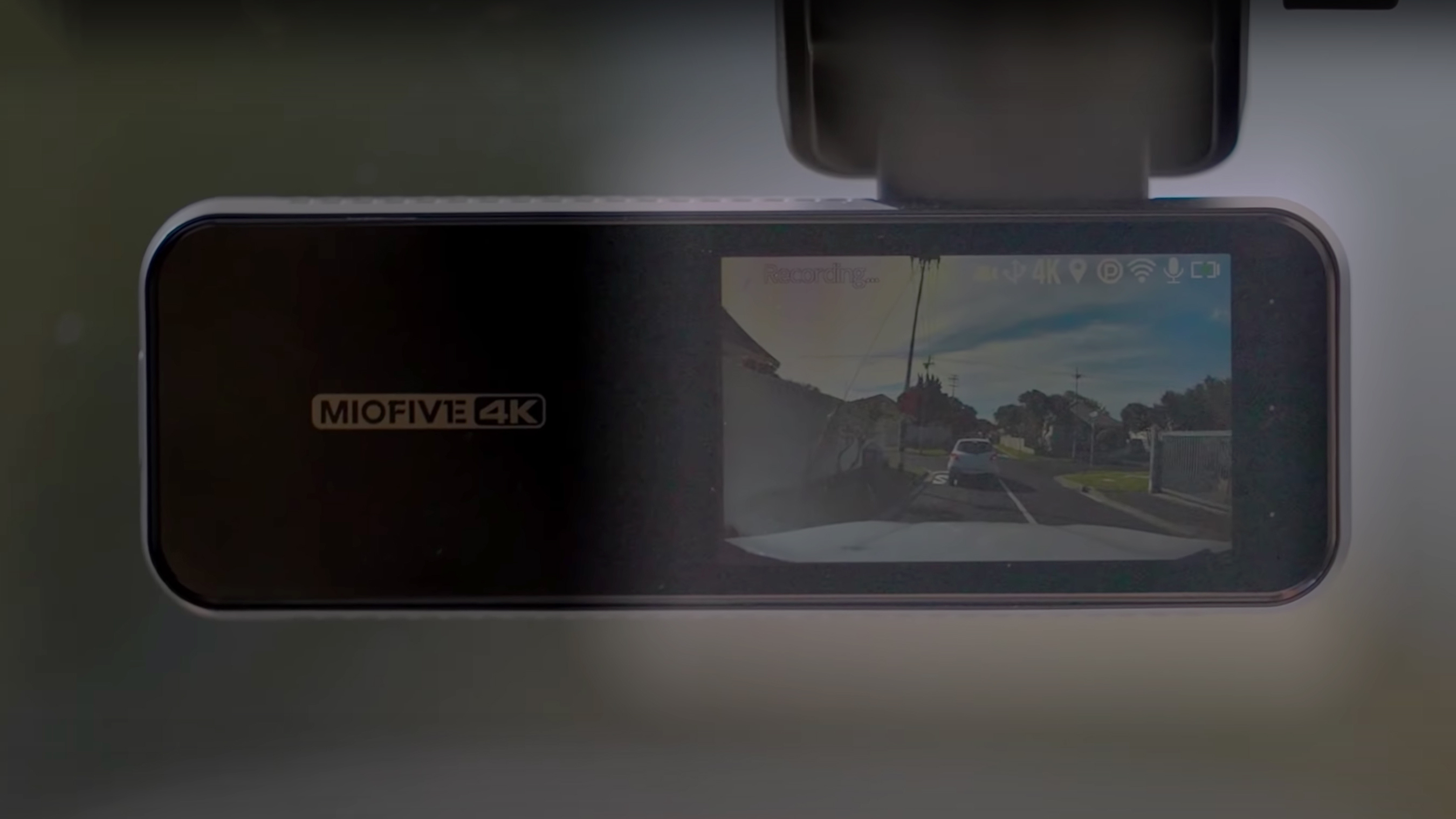 The Miofive 4K dash cam mounted on a car windhshield