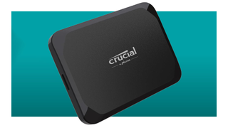 The standard version of the Crucial X9 external SSD floats in the teal-PC-Gamer-deal gradient void.