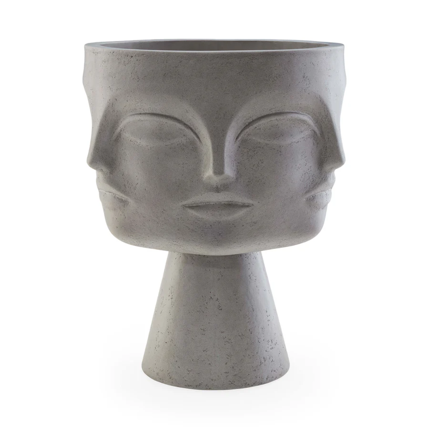 A footed planter with sculpted faces from Jonathan Adler