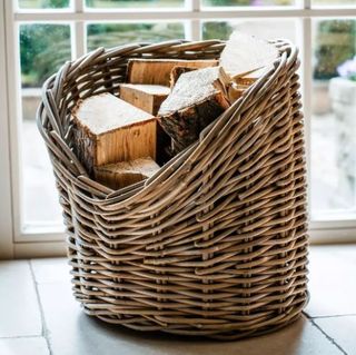 A log basket full of wood