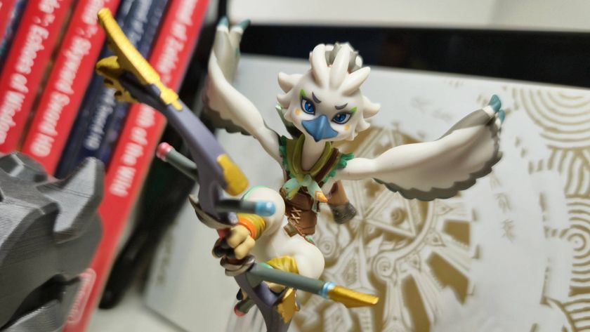 Photo of a close up of the Legend of Zelda Tears of the Kingdom Tulin amiibo sitting in front of a Switch OLED.