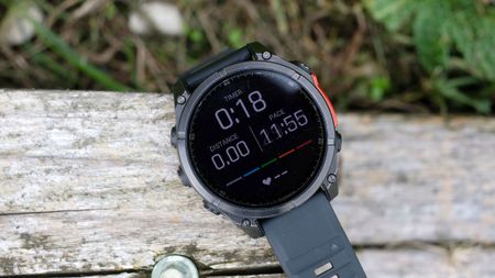 a close-up picture of our reviewer's real-time running stats in his Garmin Fenix 8 