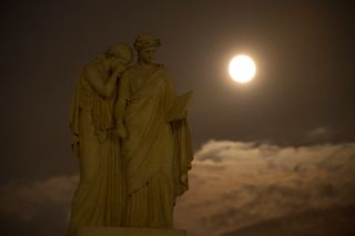 A supermoon is seen over the Peace Monument on the grounds of the U.S. Capitol building on Aug. 10, 2014, in Washington.