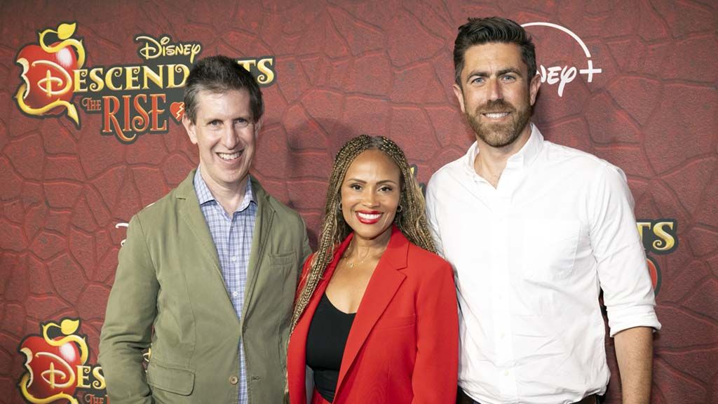 (From l.): Disney Television Group president Craig Erwich; Ayo Davis, Disney Branded Television president; and Charlie Andrews, EVP, live action and unscripted series, Disney Branded Television, at the Burbank, California, premiere event for Descendants: Rise of Red.