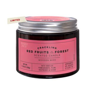 Crackling Red Fruits in the Forest Candle in a brown and pink bottle