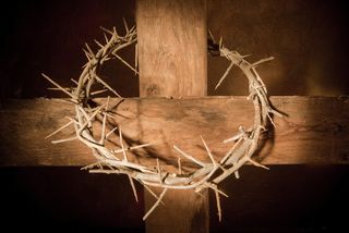 A crown of thorns on a cross.