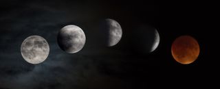 Multiple images of the moon progress in an arch across the stage; they are increasingly engulfed in shadow and the final one is red.