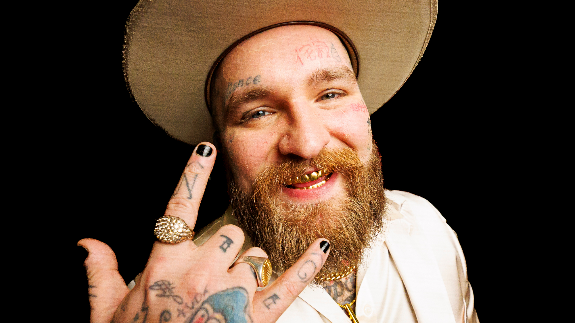 Teddy Swims in a hat