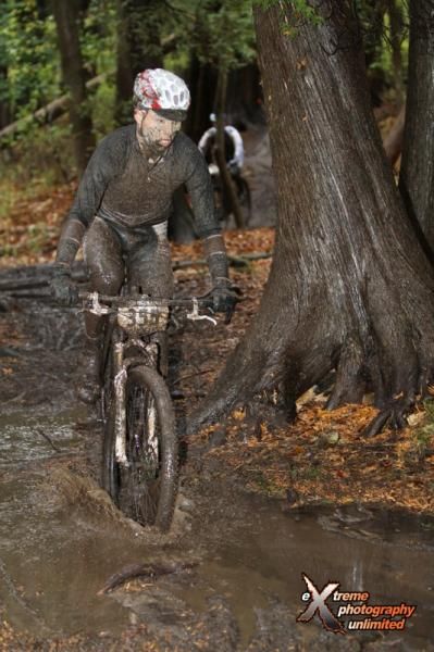Cole House (Competitive Cyclist/616) navigating through the deep mud