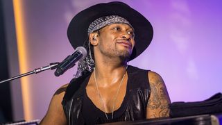 NEW YORK, NY - MAY 20: Musician D'Angelo plays a private concert at a media event announcing updates to the music streaming application Spotify on May 20, 2015 in New York City. The latest updates include the ability to stream video content, podcasts and radio programs as well as original songs for the application. (Photo by Andrew Burton/Getty Images)