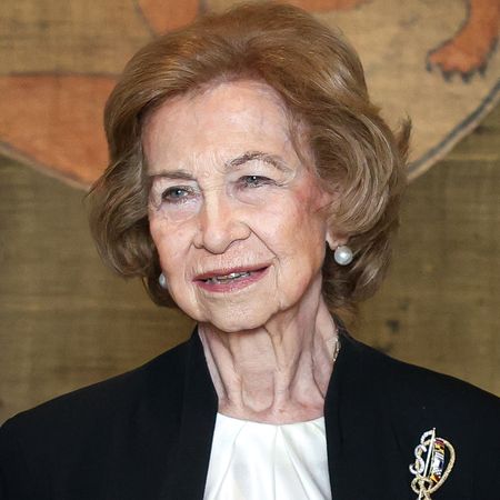 Princess Leonor saluting in a military uniform; Queen Sofia of Spain in a black blazer smiling