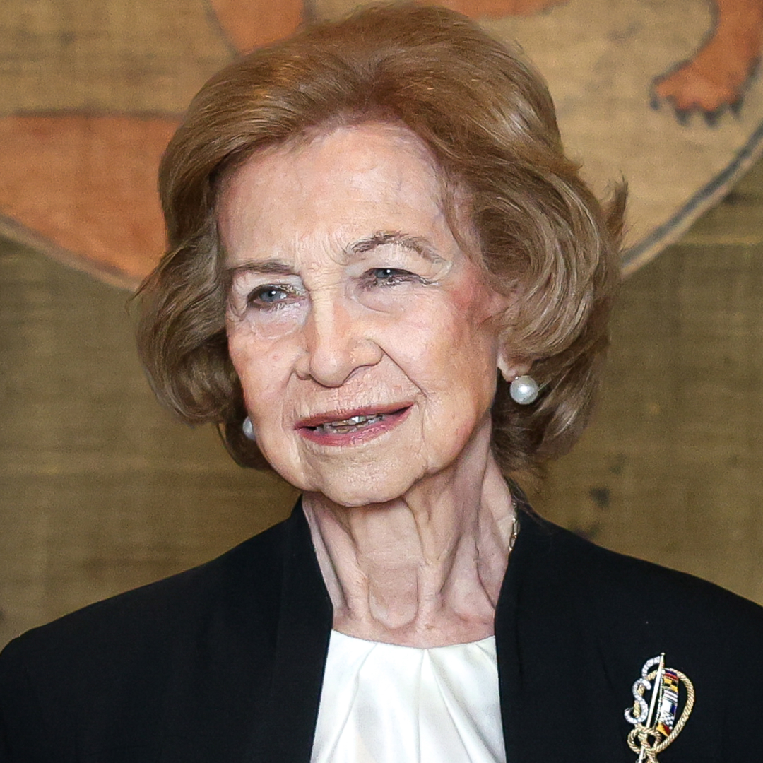 Princess Leonor saluting in a military uniform; Queen Sofia of Spain in a black blazer smiling