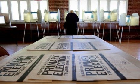 A voter casts her ballot in the California primary Tuesday.