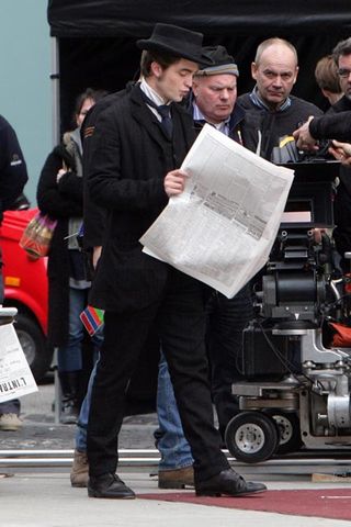 Robert Pattinson on the set of his new movie Bel Ami