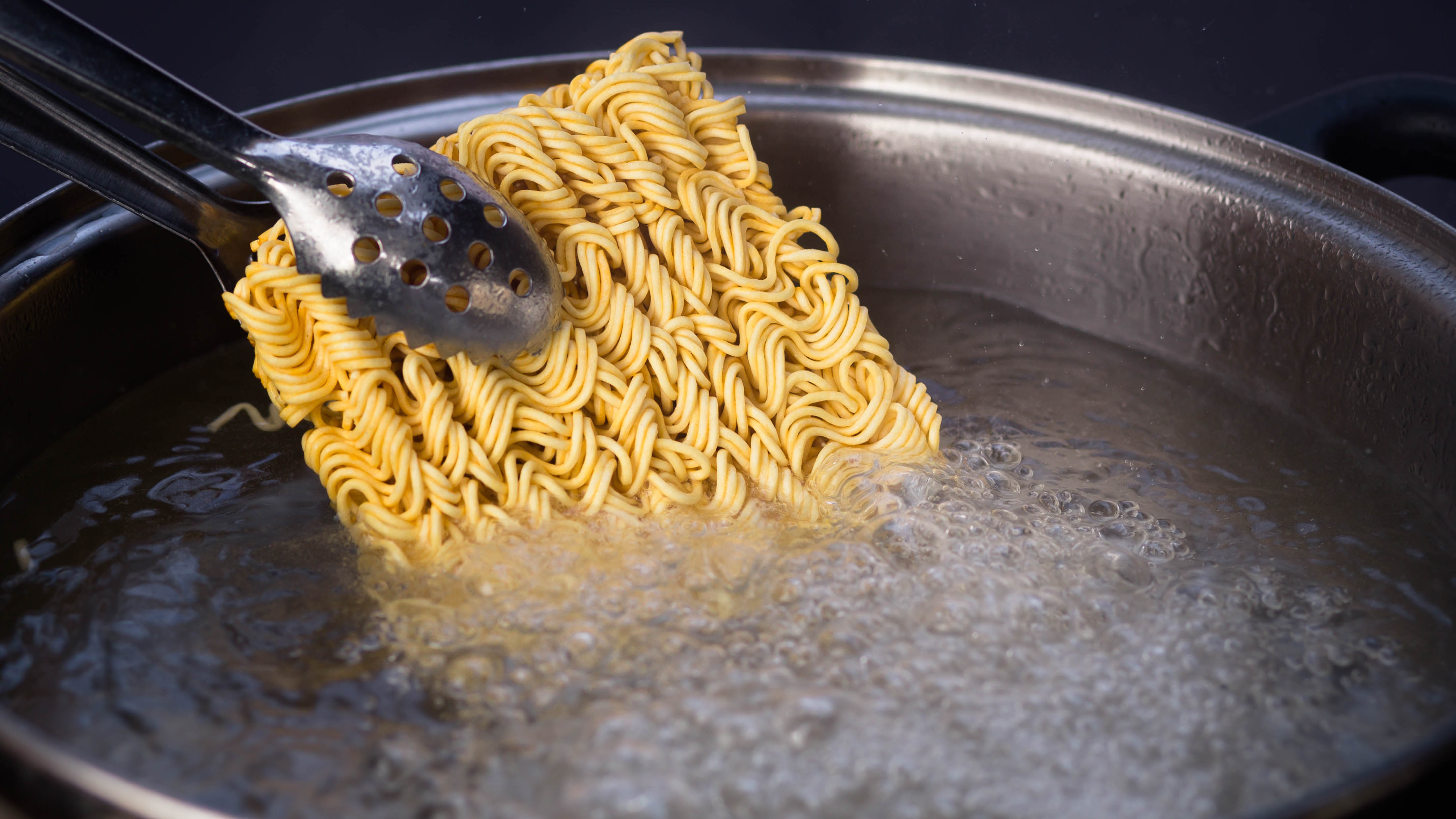 Boiling noodles in water