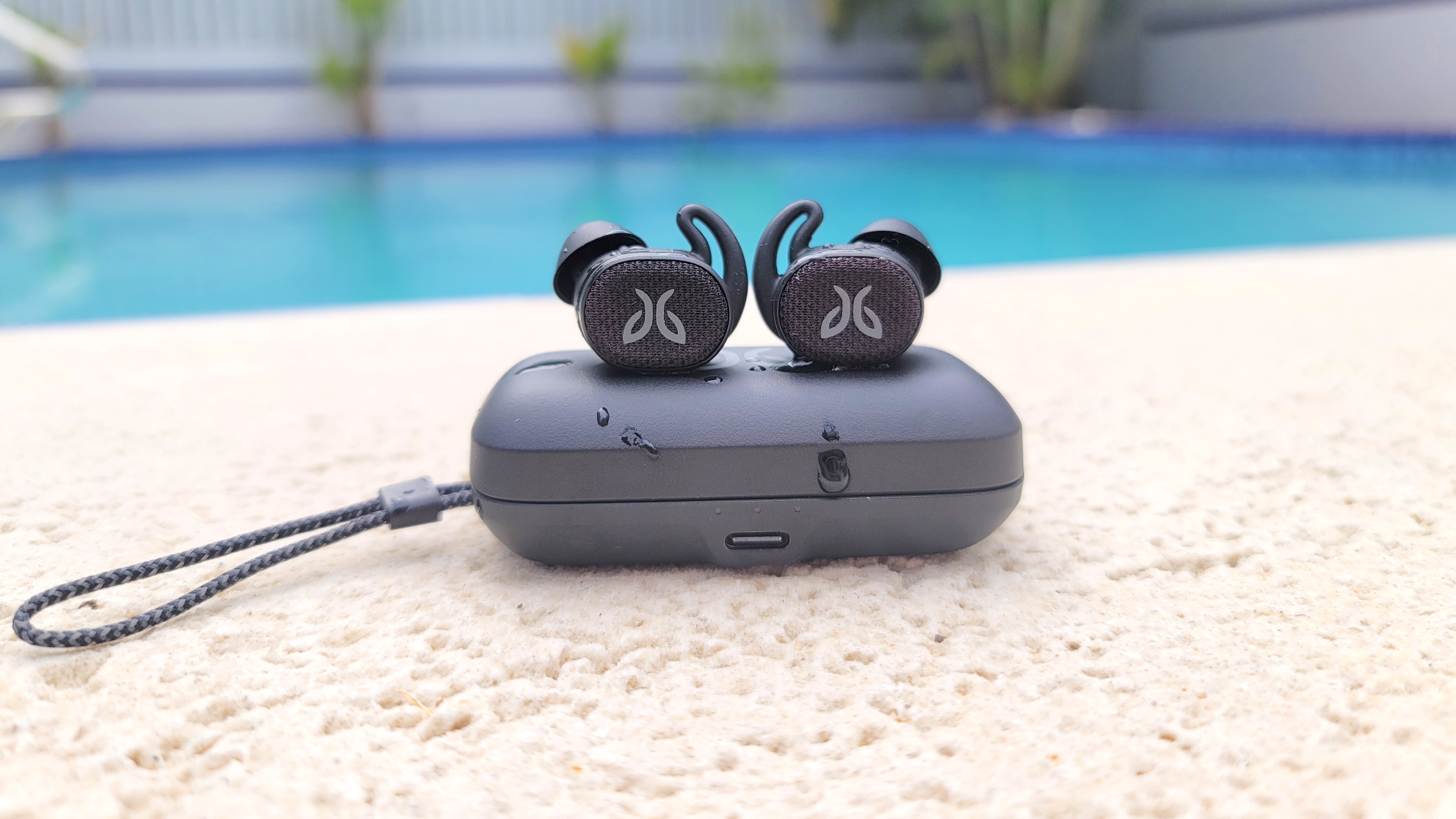 Testing water resistance on the Jaybird Vista 2 wireless earbuds and charging case