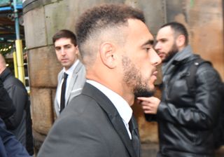 Derby County footballer Mason Bennett (closest to camera) arrives at Derby Magistrates’ Court (Jacob King/PA)