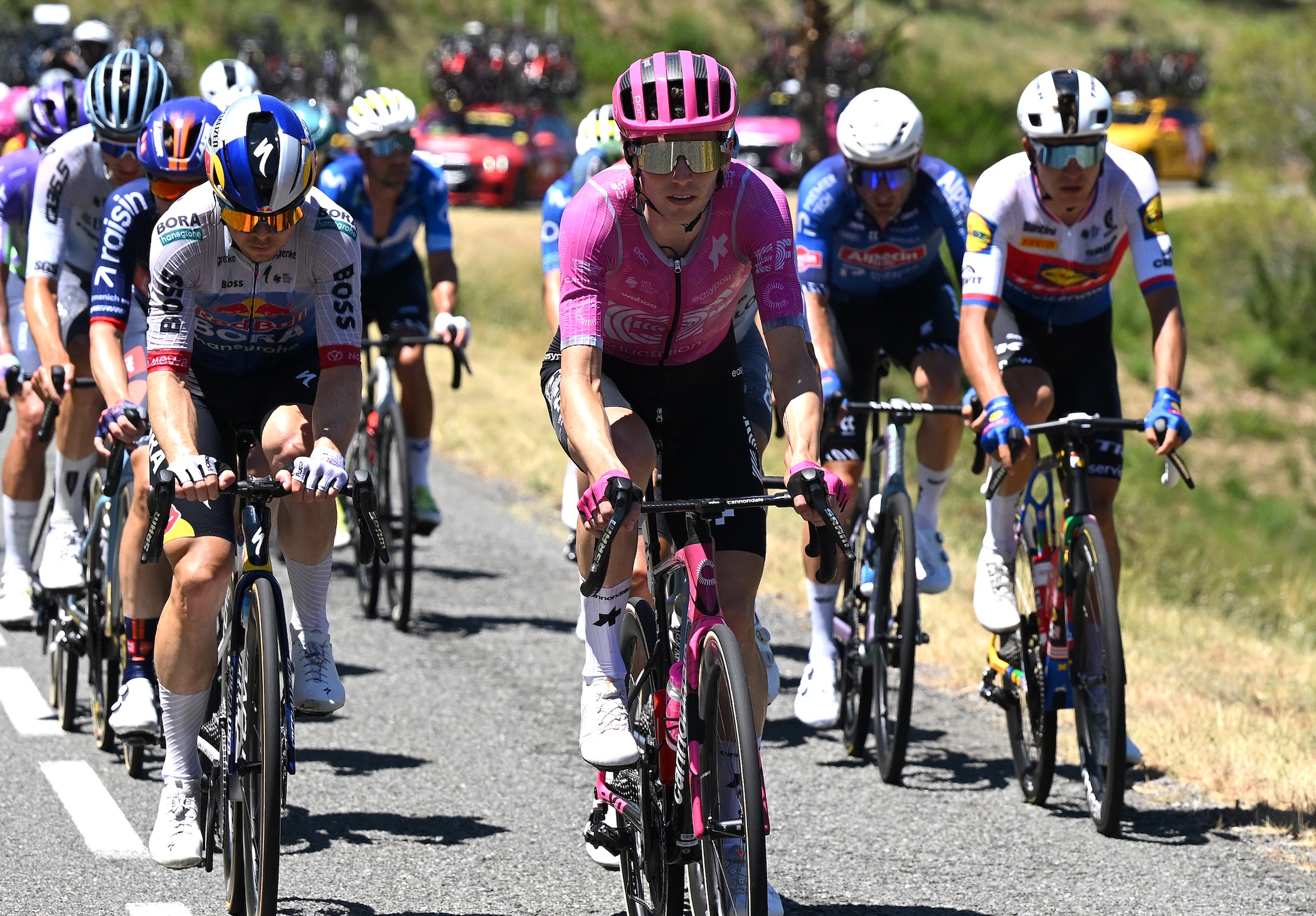 FOIX, FRANCE - JULY 07: (L-R) Jan Tratnik of Slovenia and Team Red Bull - BORA - hansgrohe and Sean Quinn of United States and Team EF Education - EasyPost compete in the breakaway during the 113th Tour de France 2026, Stage 4 a 181.9km stage from Carcassonne to Foix / #UCIWT / on July 07, 2026 in Foix, France. (Photo by  Dario Belingheri/Getty Images)