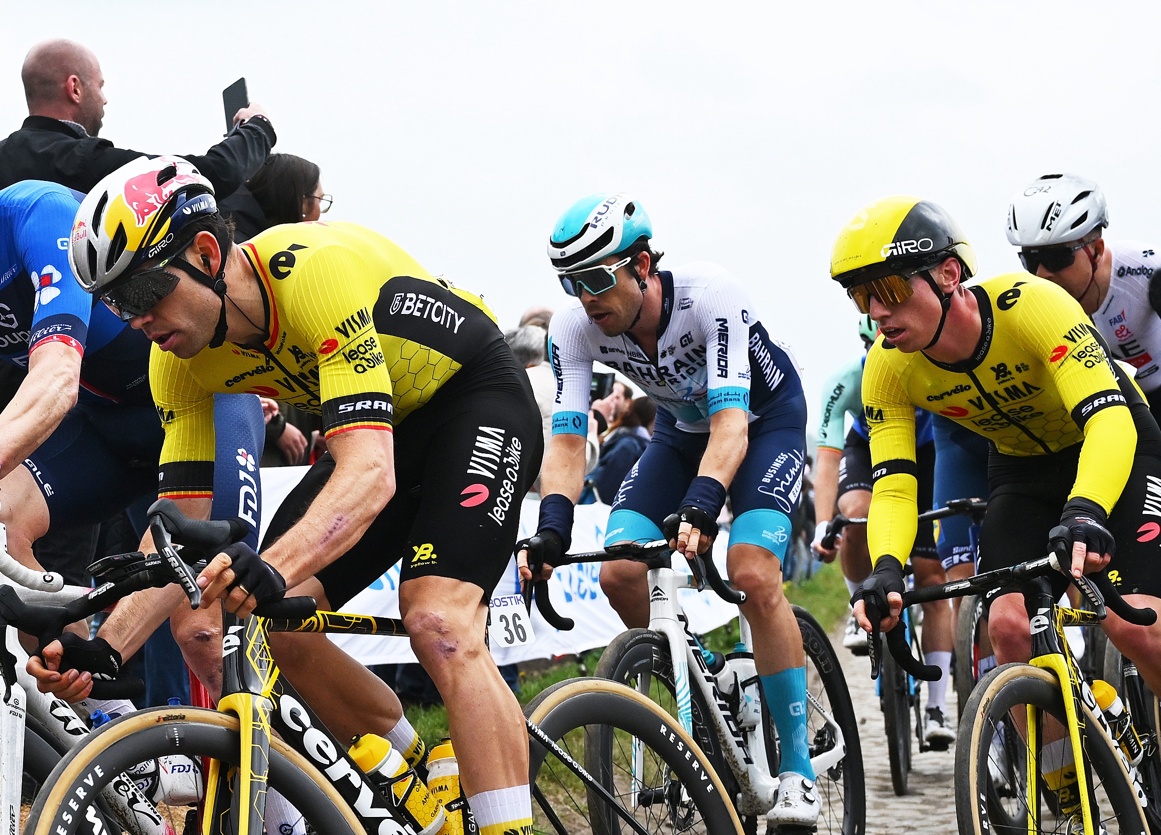 ROUBAIX, FRANCE - APRIL 13: Wout Van Aert of Belgium and Team Visma | Lease a Bike competes passing through a cobblestones sector during the 122nd Paris - Roubaix 2025 a 259.2km one day race from Compiegne to Roubaix / #UCIWT / on April 13, 2025 in Roubaix, France. (Photo by Luc Claessen/Getty Images)