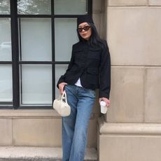 Dawn wearing jacket and jeans