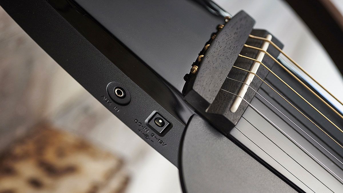 The Silent Guitar can run off battery power, but you can also run off a mains adapter