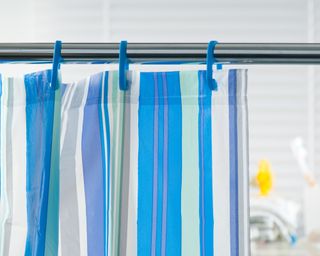 Stripy blue and white shower curtain