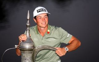 Hovland with the Dubai Desert Classic trophy