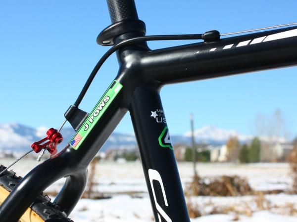 The seat cluster is a straightforward wishbone affair. Only the rear brake cable is routed across the top tube.