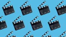 a bunch of movie clapboards against a skyblue background