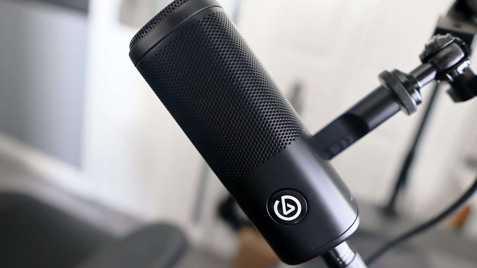 Elgato Wave DX XLR microphone on a mic arm