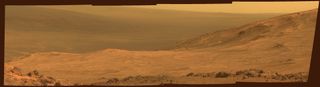 This view from NASA's Opportunity Mars rover shows part of Marathon Valley, a destination on the western rim of Endeavour Crater, as seen from an overlook north of the valley. The image was taken on March 13, 2015 by the rover's PanCam.