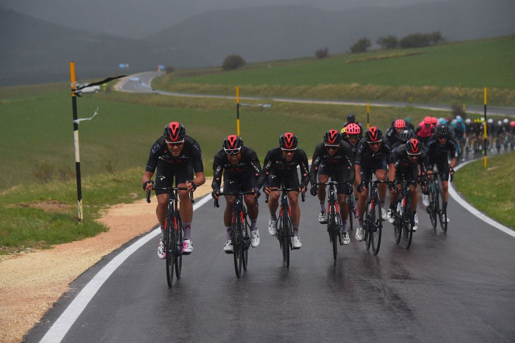 Team Ineos rider Italys Filippo Ganna L and teammates ride near Castelluccio di Norcia during the sixth stage of the Giro dItalia 2021 cycling race 160 km between Grotte di Frasassi and Ascoli Piceno San Giacomo on May 13 2021 Photo by Dario BELINGHERI AFP Photo by DARIO BELINGHERIAFP via Getty Images