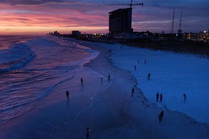 People in Panama City Beach, Florida, wait for Hurricane Michael to arrive.
