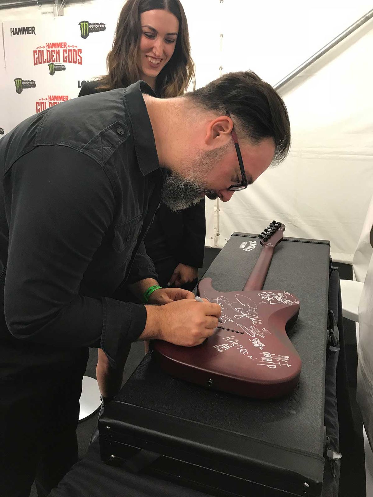 Rob Chapman with signed guitar