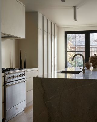 Marble kitchen island and a sink