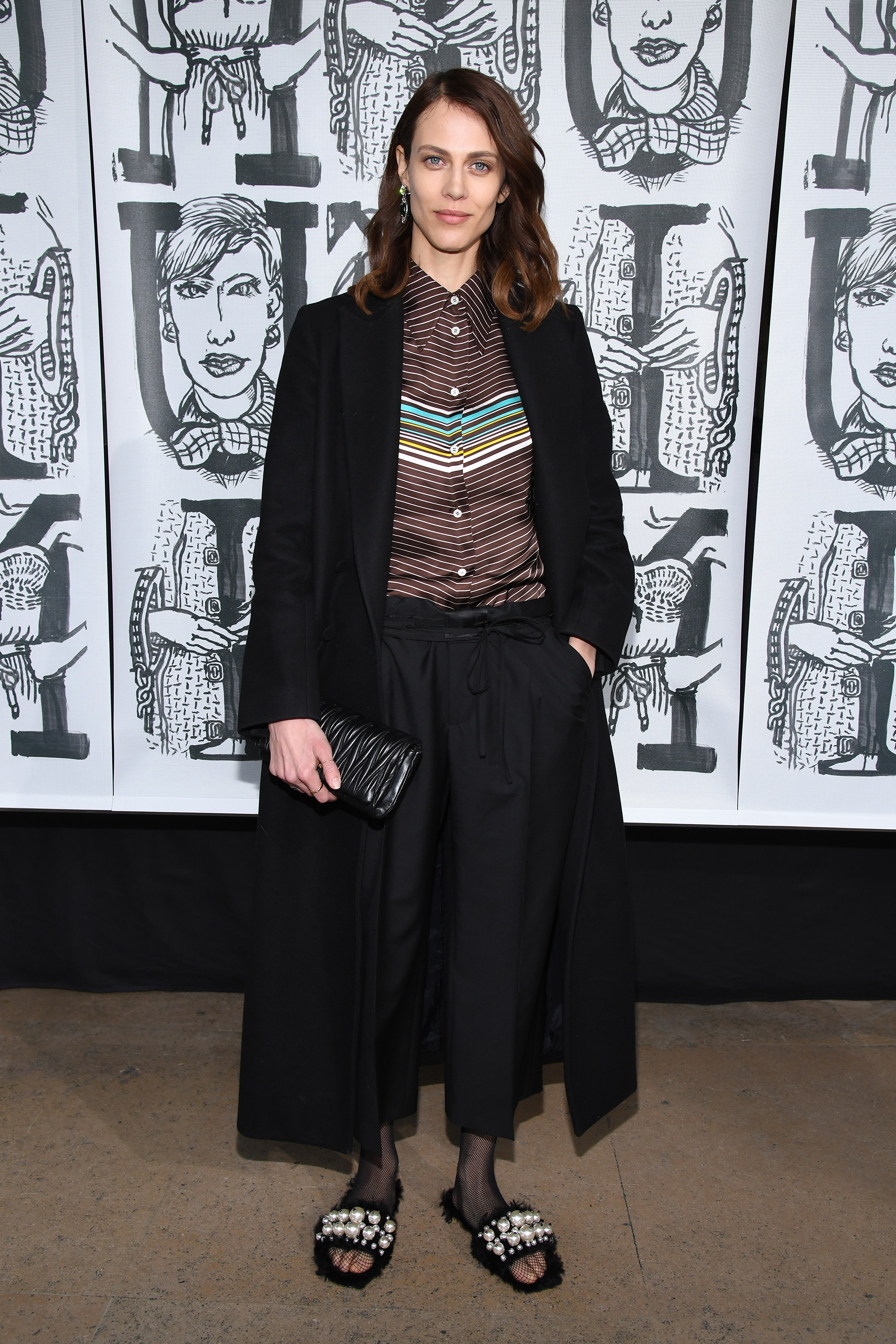 Aymeline Valade attends the Miu Miu show