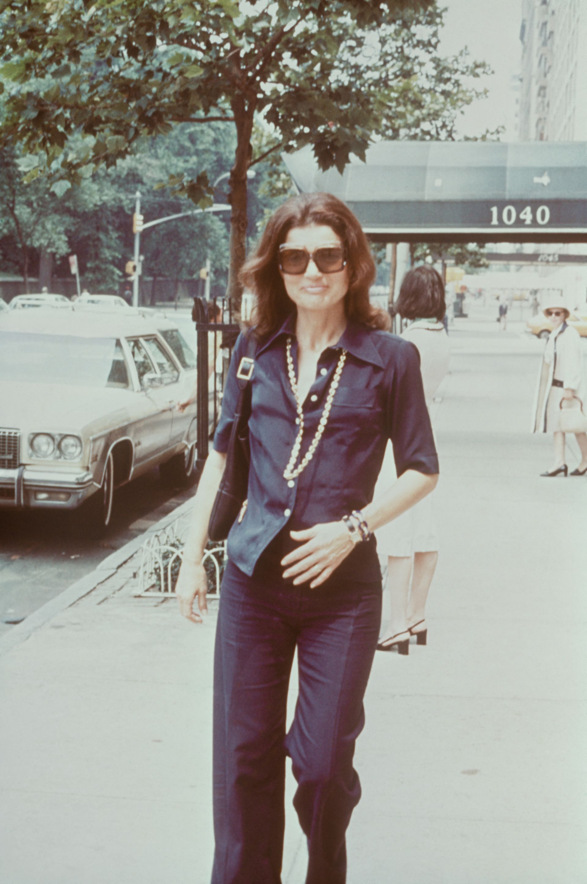 Photos of Jackie Kennedy Onassis in different late '60s and '70s-era summer staples.