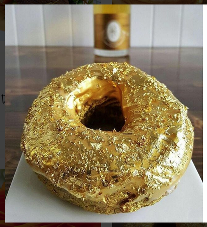 Donut covered in gold.