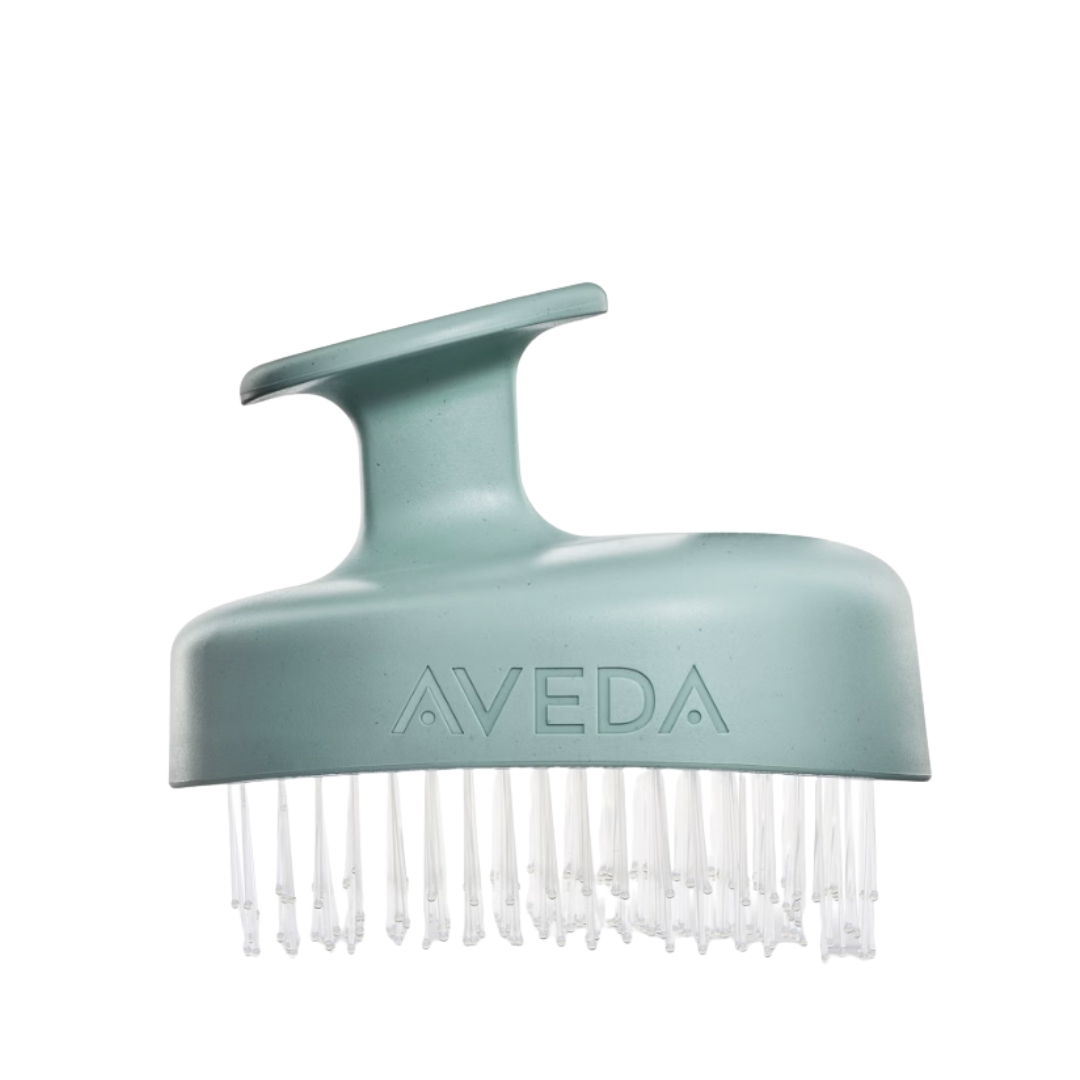 A product shot of the Aveda Scalp Solutions Stimulating Scalp Massager, on a white background