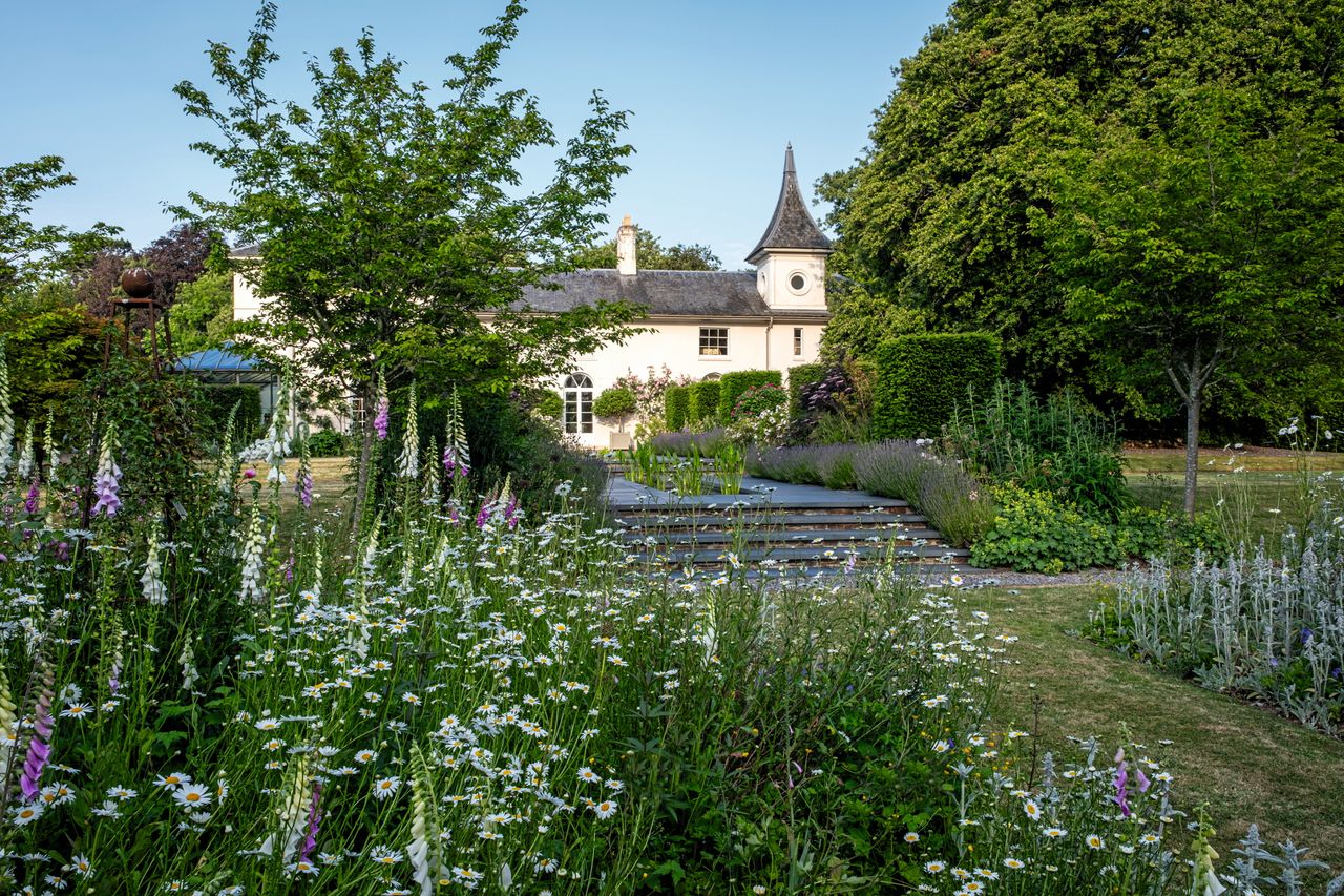 Steps leading up to the new formal garden, which replaced the unremarkable grass slope.