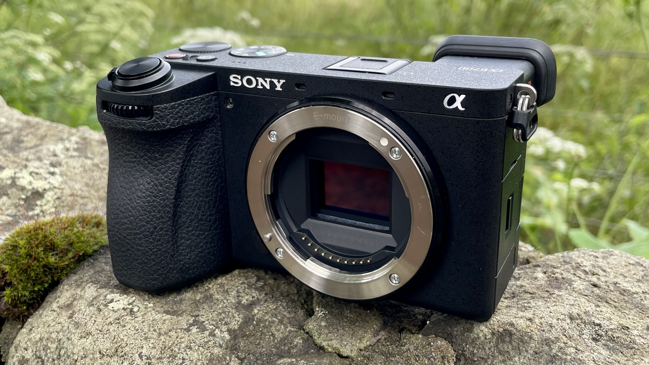 Sony Alpha A6700 mirrorless camera outside on a wall