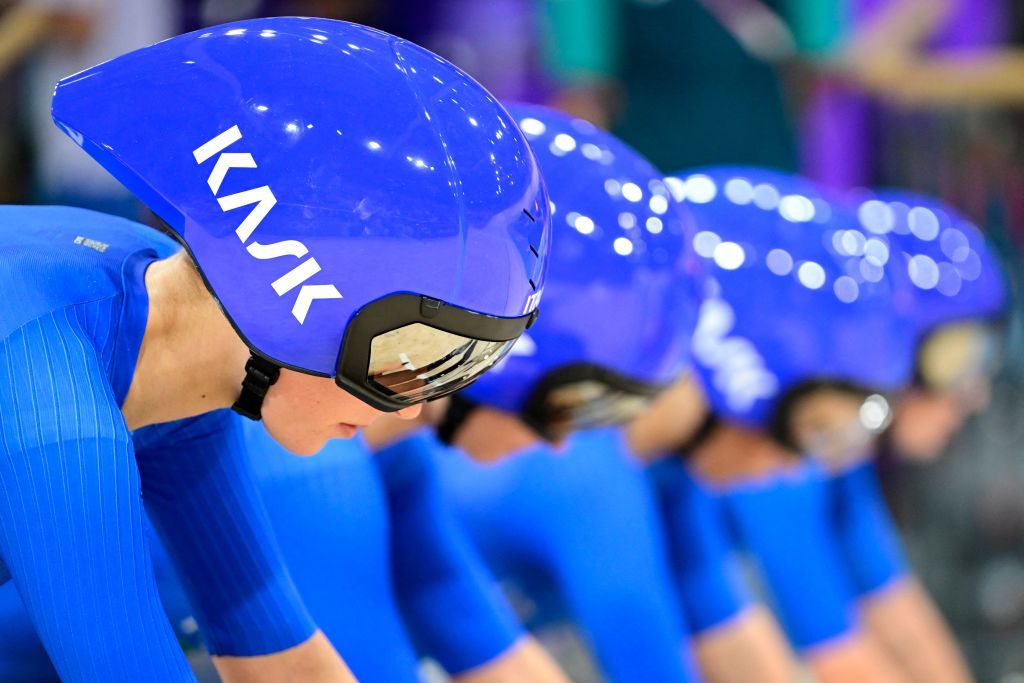 Italy's Letizia Paternoster, Italy's Chiara Consonni, Italy's Martina Fidanza and Italy's Vittoria Guazzini prepare to compete in a women's track cycling team pursuit qualifying round of the Paris 2024 Olympic Games at the Saint-Quentin-en-Yvelines National Velodrome in Montigny-le-Bretonneux, south-west of Paris, on August 6, 2024. (Photo by John MACDOUGALL / AFP)